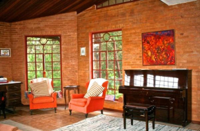 Casa aconchegante na montanha à 15min do centro!